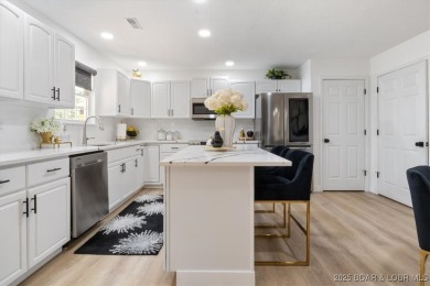 Enjoy a crisp morning sipping your morning coffee and watching on Tan-Tar-A Golf Club in Missouri - for sale on GolfHomes.com, golf home, golf lot