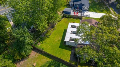 This sprawling custom ranch blends modern updates with classic on Greate Bay Golf Club in New Jersey - for sale on GolfHomes.com, golf home, golf lot