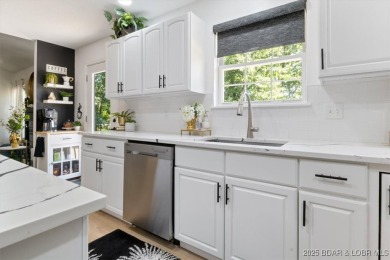 Enjoy a crisp morning sipping your morning coffee and watching on Tan-Tar-A Golf Club in Missouri - for sale on GolfHomes.com, golf home, golf lot