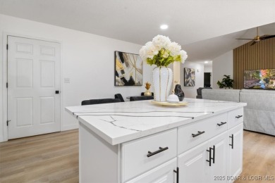 Enjoy a crisp morning sipping your morning coffee and watching on Tan-Tar-A Golf Club in Missouri - for sale on GolfHomes.com, golf home, golf lot
