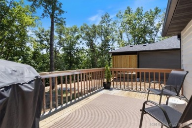 Enjoy a crisp morning sipping your morning coffee and watching on Tan-Tar-A Golf Club in Missouri - for sale on GolfHomes.com, golf home, golf lot
