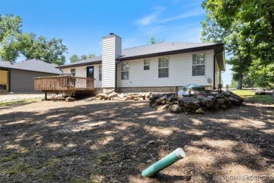 Enjoy a crisp morning sipping your morning coffee and watching on Tan-Tar-A Golf Club in Missouri - for sale on GolfHomes.com, golf home, golf lot