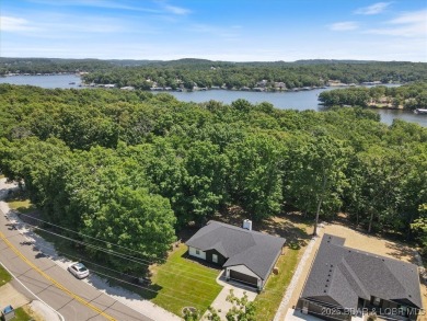 Enjoy a crisp morning sipping your morning coffee and watching on Tan-Tar-A Golf Club in Missouri - for sale on GolfHomes.com, golf home, golf lot