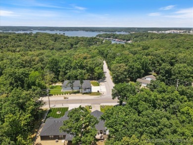 Enjoy a crisp morning sipping your morning coffee and watching on Tan-Tar-A Golf Club in Missouri - for sale on GolfHomes.com, golf home, golf lot