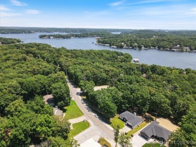 Enjoy a crisp morning sipping your morning coffee and watching on Tan-Tar-A Golf Club in Missouri - for sale on GolfHomes.com, golf home, golf lot
