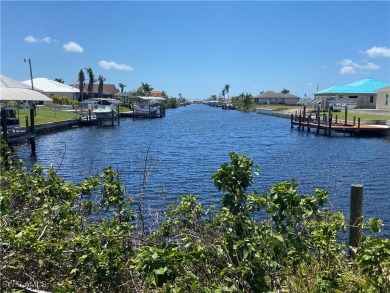 Rare Southern exposure GULF ACCESS WITH SEAWALL lot looking down on Burnt Store Golf Club in Florida - for sale on GolfHomes.com, golf home, golf lot