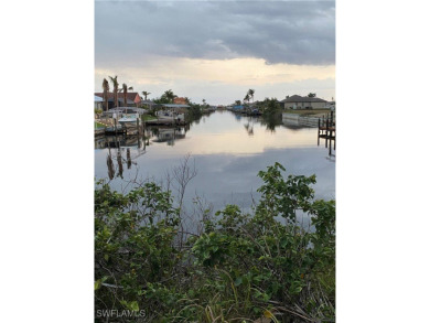 Rare Southern exposure GULF ACCESS WITH SEAWALL lot looking down on Burnt Store Golf Club in Florida - for sale on GolfHomes.com, golf home, golf lot