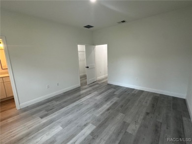 Check out this amazing 4-bedroom home in Citrus Springs! If on Citrus Springs Country Club in Florida - for sale on GolfHomes.com, golf home, golf lot