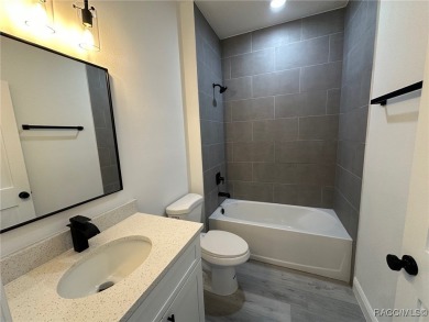 Check out this amazing 4-bedroom home in Citrus Springs! If on Citrus Springs Country Club in Florida - for sale on GolfHomes.com, golf home, golf lot