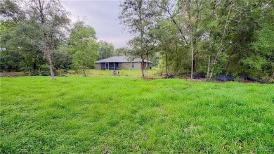 Check out this amazing 4-bedroom home in Citrus Springs! If on Citrus Springs Country Club in Florida - for sale on GolfHomes.com, golf home, golf lot
