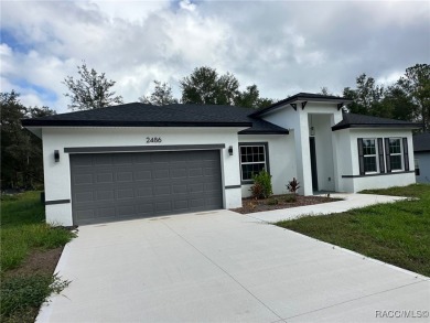 Check out this amazing 4-bedroom home in Citrus Springs! If on Citrus Springs Country Club in Florida - for sale on GolfHomes.com, golf home, golf lot