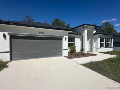 Check out this amazing 4-bedroom home in Citrus Springs! Seller on Citrus Springs Country Club in Florida - for sale on GolfHomes.com, golf home, golf lot