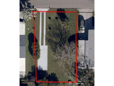In the heart of Barefoot Bay, walking distance to golf course on Barefoot Bay Golf Course in Florida - for sale on GolfHomes.com, golf home, golf lot