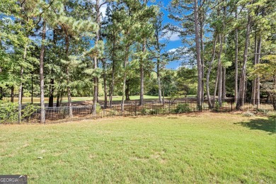 Discover this stunning Craftsman-style home featuring 4 bedrooms on Canongate At Georgia National Golf Club in Georgia - for sale on GolfHomes.com, golf home, golf lot