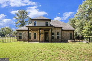 Discover this stunning Craftsman-style home featuring 4 bedrooms on Canongate At Georgia National Golf Club in Georgia - for sale on GolfHomes.com, golf home, golf lot