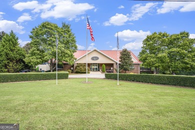 Discover this stunning Craftsman-style home featuring 4 bedrooms on Canongate At Georgia National Golf Club in Georgia - for sale on GolfHomes.com, golf home, golf lot