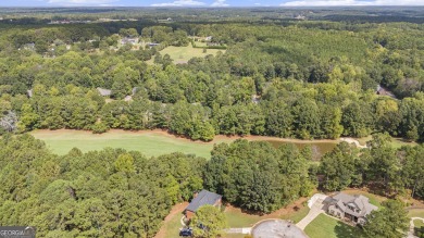 Discover this stunning Craftsman-style home featuring 4 bedrooms on Canongate At Georgia National Golf Club in Georgia - for sale on GolfHomes.com, golf home, golf lot