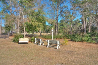 This charming brick ranch home is located in a prestigious gated on Santee-Cooper Country Club in South Carolina - for sale on GolfHomes.com, golf home, golf lot