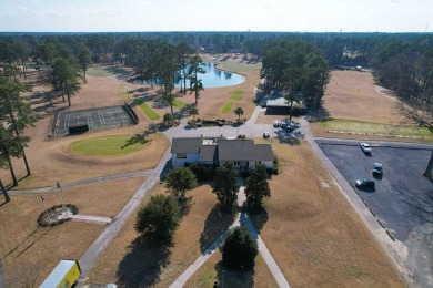 This charming brick ranch home is located in a prestigious gated on Santee-Cooper Country Club in South Carolina - for sale on GolfHomes.com, golf home, golf lot