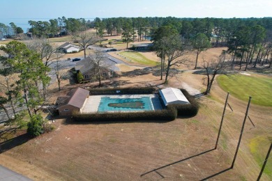 This charming brick ranch home is located in a prestigious gated on Santee-Cooper Country Club in South Carolina - for sale on GolfHomes.com, golf home, golf lot