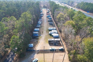 This charming brick ranch home is located in a prestigious gated on Santee-Cooper Country Club in South Carolina - for sale on GolfHomes.com, golf home, golf lot