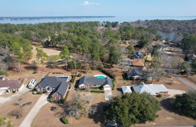 This charming brick ranch home is located in a prestigious gated on Santee-Cooper Country Club in South Carolina - for sale on GolfHomes.com, golf home, golf lot