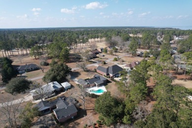 This charming brick ranch home is located in a prestigious gated on Santee-Cooper Country Club in South Carolina - for sale on GolfHomes.com, golf home, golf lot