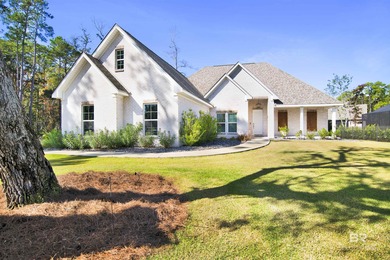 Discover exceptional coastal living in this stunning 3-bedroom on Peninsula Golf and Racquet Club in Alabama - for sale on GolfHomes.com, golf home, golf lot