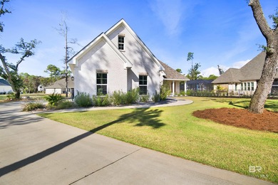 Discover exceptional coastal living in this stunning 3-bedroom on Peninsula Golf and Racquet Club in Alabama - for sale on GolfHomes.com, golf home, golf lot