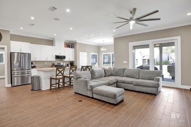 Discover exceptional coastal living in this stunning 3-bedroom on Peninsula Golf and Racquet Club in Alabama - for sale on GolfHomes.com, golf home, golf lot