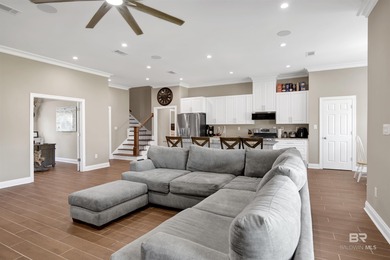 Discover exceptional coastal living in this stunning 3-bedroom on Peninsula Golf and Racquet Club in Alabama - for sale on GolfHomes.com, golf home, golf lot