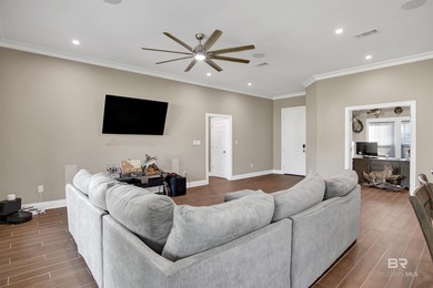 Discover exceptional coastal living in this stunning 3-bedroom on Peninsula Golf and Racquet Club in Alabama - for sale on GolfHomes.com, golf home, golf lot