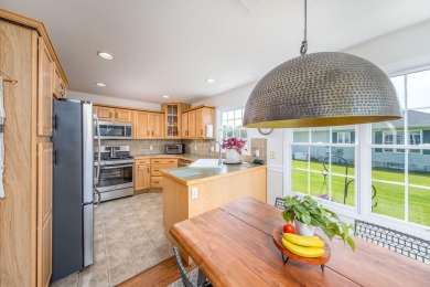 Enjoy stunning golf course views from this meticulously on Canadian Lakes Country Club-The Royal Course in Michigan - for sale on GolfHomes.com, golf home, golf lot