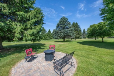 Enjoy stunning golf course views from this meticulously on Canadian Lakes Country Club-The Royal Course in Michigan - for sale on GolfHomes.com, golf home, golf lot