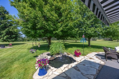 Enjoy stunning golf course views from this meticulously on Canadian Lakes Country Club-The Royal Course in Michigan - for sale on GolfHomes.com, golf home, golf lot