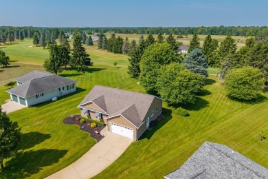 Enjoy stunning golf course views from this meticulously on Canadian Lakes Country Club-The Royal Course in Michigan - for sale on GolfHomes.com, golf home, golf lot