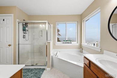 Sprawling two-story in the legends golf community overlooking on Country Club at the Legends in Missouri - for sale on GolfHomes.com, golf home, golf lot