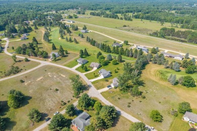 Enjoy stunning golf course views from this meticulously on Canadian Lakes Country Club-The Royal Course in Michigan - for sale on GolfHomes.com, golf home, golf lot