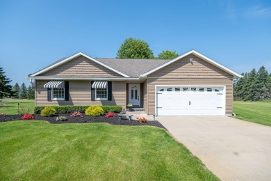 Enjoy stunning golf course views from this meticulously on Canadian Lakes Country Club-The Royal Course in Michigan - for sale on GolfHomes.com, golf home, golf lot