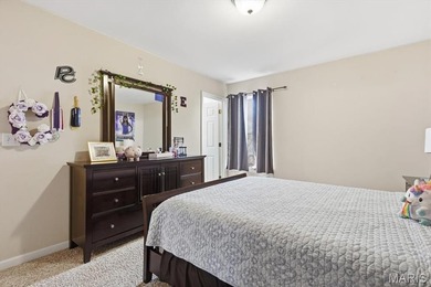 Sprawling two-story in the legends golf community overlooking on Country Club at the Legends in Missouri - for sale on GolfHomes.com, golf home, golf lot