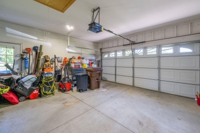Enjoy stunning golf course views from this meticulously on Canadian Lakes Country Club-The Royal Course in Michigan - for sale on GolfHomes.com, golf home, golf lot