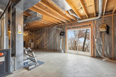 Sprawling two-story in the legends golf community overlooking on Country Club at the Legends in Missouri - for sale on GolfHomes.com, golf home, golf lot