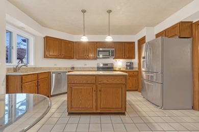 Discover the perfect blend of comfort and elegance in this on Oak Hills Country Club in Illinois - for sale on GolfHomes.com, golf home, golf lot