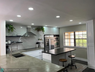 Completely remodeled condo with spectacular light and golf on Indian Spring Golf and Country Club in Florida - for sale on GolfHomes.com, golf home, golf lot