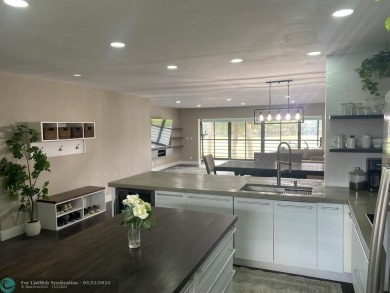 Completely remodeled condo with spectacular light and golf on Indian Spring Golf and Country Club in Florida - for sale on GolfHomes.com, golf home, golf lot