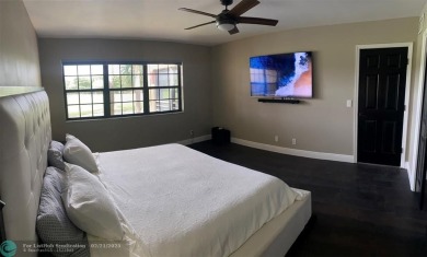 Completely remodeled condo with spectacular light and golf on Indian Spring Golf and Country Club in Florida - for sale on GolfHomes.com, golf home, golf lot