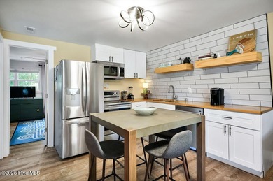 Welcome to 412 Womble Street which is located in the highly on Founders Club At St. James Plantation in North Carolina - for sale on GolfHomes.com, golf home, golf lot