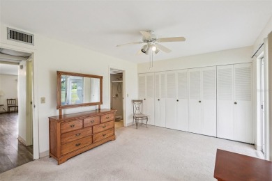 Under contract-accepting backup offers. Affordable end unit on Kings Point Executive Golf Course in Florida - for sale on GolfHomes.com, golf home, golf lot
