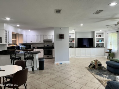 Come see this furnished, split level home that is move-in ready on Sunkist Country Club, Inc. in Mississippi - for sale on GolfHomes.com, golf home, golf lot