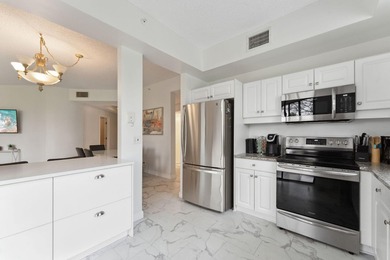 Welcome to this light and bright first-floor condo in the on Boca Pointe Country Club in Florida - for sale on GolfHomes.com, golf home, golf lot